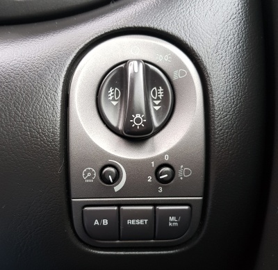 Headlamp switch module with Message Centre controls